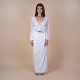 Giselle Off-White Sequin Maxi Long Skirt. Perfect for a boho look, nights out, weddings, brides, white parties and spring transitions. Handcrafted with intricate sequin embellishments, this skirt adds glamour to any occasion. Indulge midi skirts, high waisted skirt, skirt with a slit, long skirt. Featured here with the Odessa Top