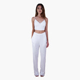 Evan sequin off-white pants are perfect for glamorous nights out, weddings, and special occasions, offering both style and comfort. Elevate your look with these versatile and chic pants. Front view